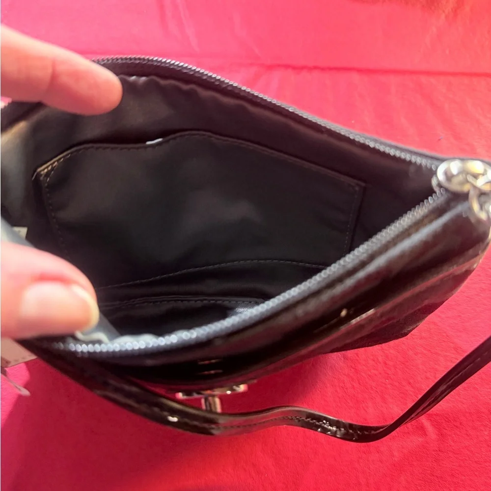 Coach Park Signature Medium Wristlet. PRK SIG MED WRST," which stands for Park - Picture 3 of 4